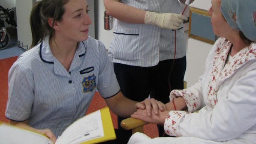 Nurse caring for patient